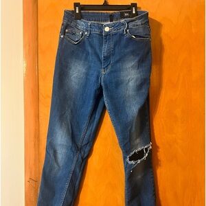 Res Denim skinny jeans. Ripping in the knee.